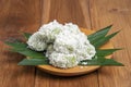 shockingbite Klepon Cake Dessert on Table Wood and Black Background