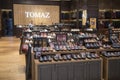 Shoe collection of black and brown leather on shelf