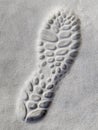 Shoe foot print in fresh snow - winter closeup Royalty Free Stock Photo