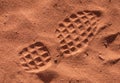 Shoe footprint on sand Royalty Free Stock Photo