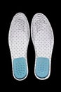Shoe insole with size markings on a black background Royalty Free Stock Photo