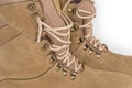 Shoe lacing of beige leather combat boots, fragment close-up Royalty Free Stock Photo