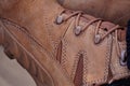 Shoe of man on foot. Sturdy shoes for walking and hiking. Healthy movement.