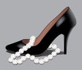 A shoe and pearl beads Royalty Free Stock Photo