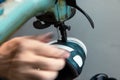 Shoe rapiring. Shoemaker repairing a sneaker on the sewing machine. Royalty Free Stock Photo