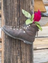 Shoe with rose on post