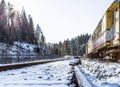 Shoe. Train. Rusty. Mountains. Snow. Winter. Forest Royalty Free Stock Photo