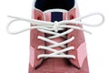 Shoelace knot of a canvas shoe Royalty Free Stock Photo