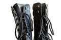 Shoelaces in black army boots close-up on white background Royalty Free Stock Photo