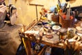 Shoemaker performs shoes in the studio craft