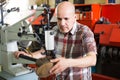 Shoemaker working in shoe atelier Royalty Free Stock Photo