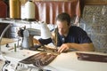 Shoemaker In Workshop