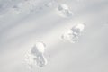 Shoeprints in snow - danger walking in the snow.