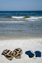 Shoes on the beach Royalty Free Stock Photo