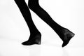 Shoes and black tights on slim legs of girl Royalty Free Stock Photo