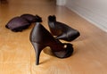 Shoes and bra on bedroom floor Royalty Free Stock Photo