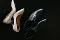 Shoes of the bride and groom. Royalty Free Stock Photo