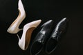 Shoes of the bride and groom. Royalty Free Stock Photo