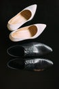 Shoes of the bride and groom. Royalty Free Stock Photo