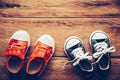 Shoes for children on wooden floor - lifestyle Royalty Free Stock Photo