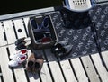 Shoes next to the footbridge of a luxury ship moored in palma seaport during the 50th Boatshow fair.a de mallorca seaport.