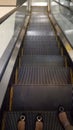 Shoes, escalators, zebra, couple, black and white Royalty Free Stock Photo