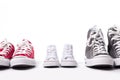 Shoes in father big, mother medium and son or daughter small kid size in family love concept Royalty Free Stock Photo