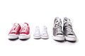 Shoes in father big, mother medium and son or daughter small kid size in family love concept Royalty Free Stock Photo