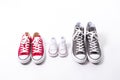 Shoes in father big, mother medium and son or daughter small kid size in family love concept Royalty Free Stock Photo