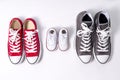 Shoes in father big, mother medium and son or daughter small kid size in family love concept Royalty Free Stock Photo