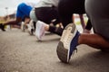 Shoes, fitness or people at the start of a marathon race with performance goals in workout or runners exercise. Back