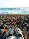 Shoes gilrs on the beach Royalty Free Stock Photo