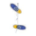 Shoes hanging on nail isolated on white background. Pair of sports footwear hang on peg.