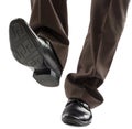 Shoes and legs of businessman caution step Royalty Free Stock Photo