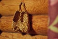 Shoes made of straw hanging on the wall