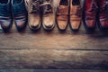 Shoes for men various styles on a wooden floor - lifestyles. Royalty Free Stock Photo