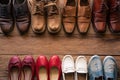 shoes with men and women various styles on a wooden floor - life Royalty Free Stock Photo