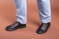 Shoes mens shoes model jeans studio pose Royalty Free Stock Photo