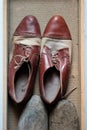 Shoes in an old room. Old home accessories for a housewife. Royalty Free Stock Photo