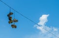 Shoes on the power line Royalty Free Stock Photo