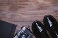 Shoes, retro camera and notepad