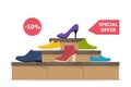 Shoes sale in store. Shoe boxes with footwear. Stylish modern sneakers, woman high heel shoes on box, side view. Price tag with Royalty Free Stock Photo