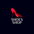 Shoes shop logo. Red female beautiful shoes emblem and letters on a isolated on a dark background.
