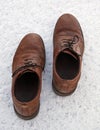 A pair of Men's Shoes on the snow. Royalty Free Stock Photo