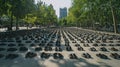 Shoes symbolize refugee struggles in a public square installation for awareness. World Refugee Day