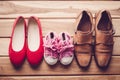 Shoes, three pairs of dad, mom, daughter - the family concept.
