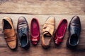 Shoes various styles  on a wooden floor - lifestyles Royalty Free Stock Photo