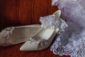 Shoes veil and garter of the bride.