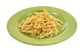 Shoestring potatoes on green plate Royalty Free Stock Photo