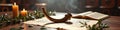 Shofar on ancient hebrew manuscript with candles and olive branches in dimly lit room Royalty Free Stock Photo